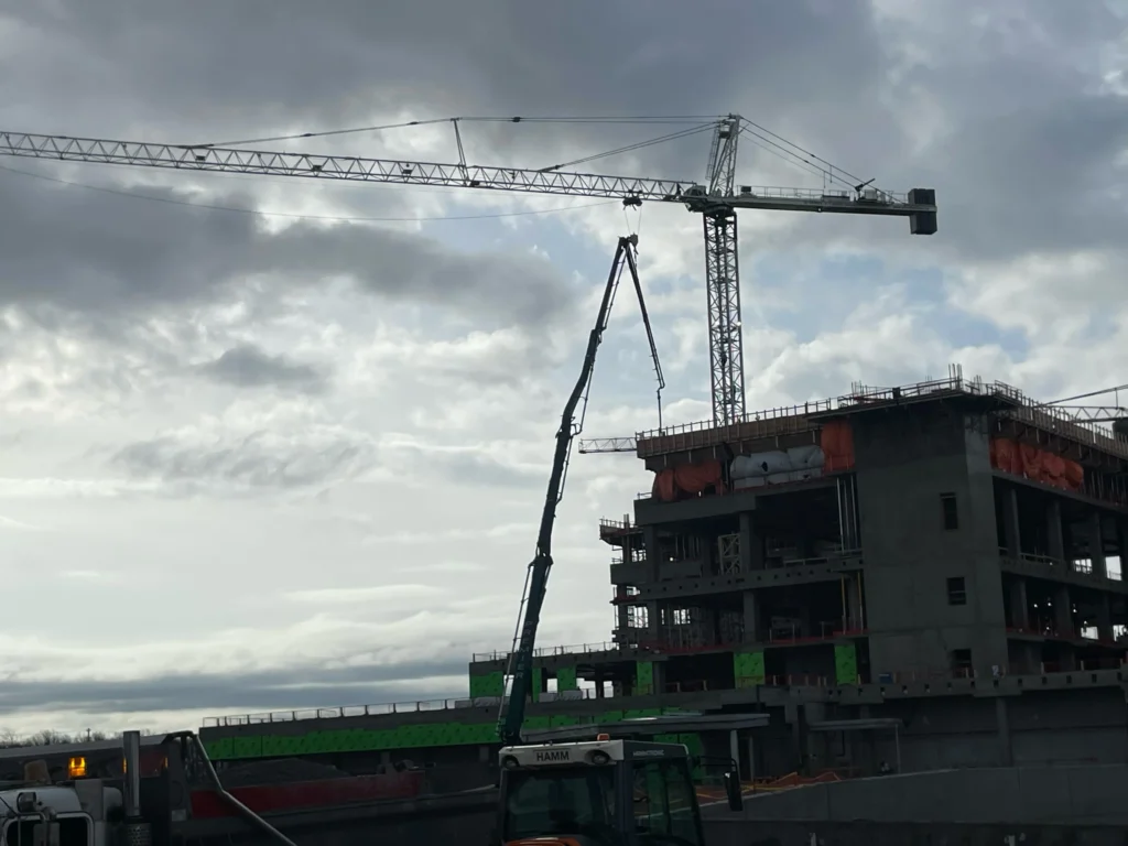 65M boom pump deployed at Niagara Hospital construction site - Premier Concrete Pumping