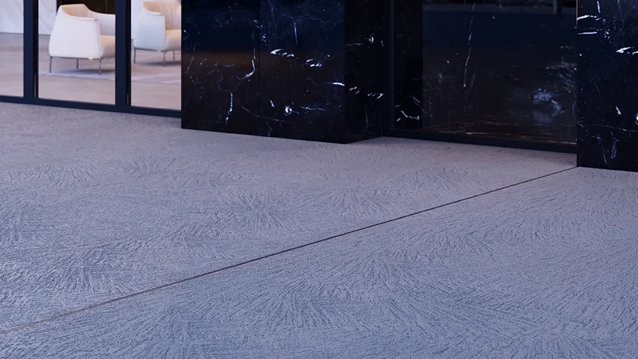 Smooth, machine-finished concrete surface outside a modern building with a professional, polished appearance.